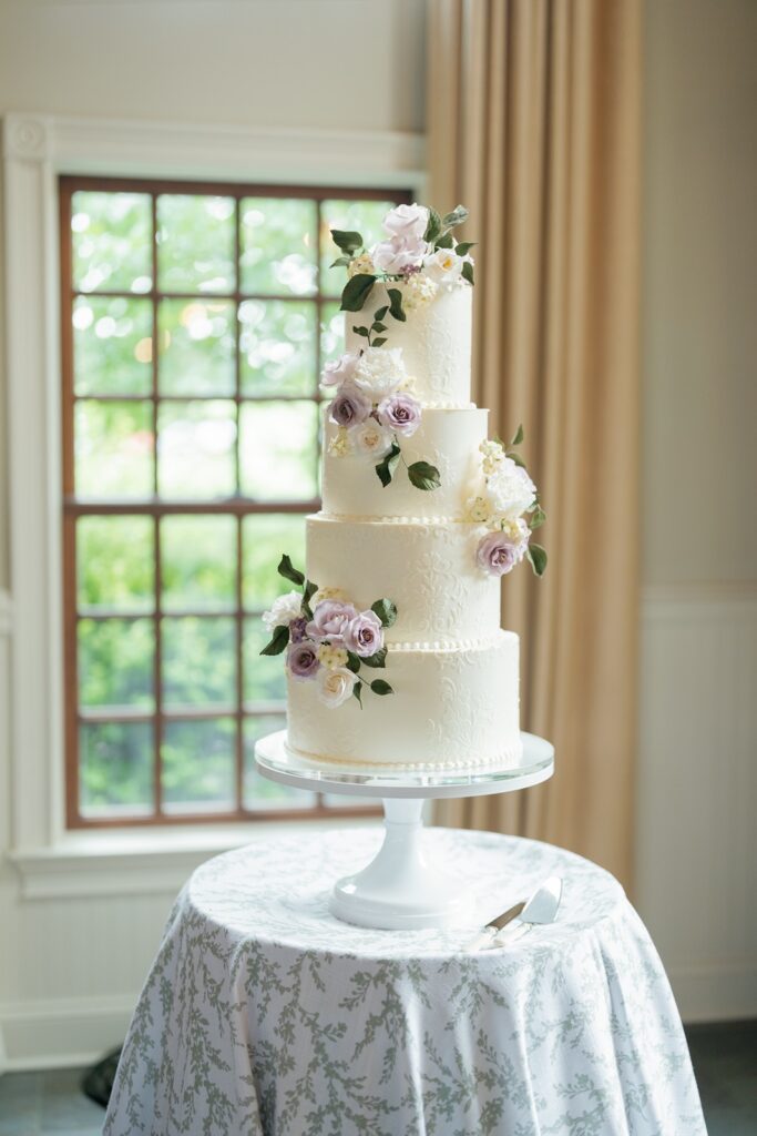 Fine art wedding cake with sugar florals at Charlottesville wedding venue Early Mountain Vineyards