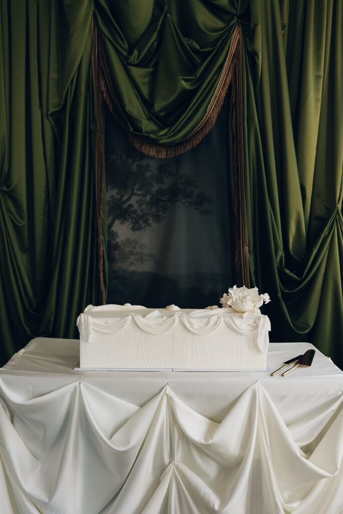 Luxury white wedding cake with layered texture and refined neutral palette